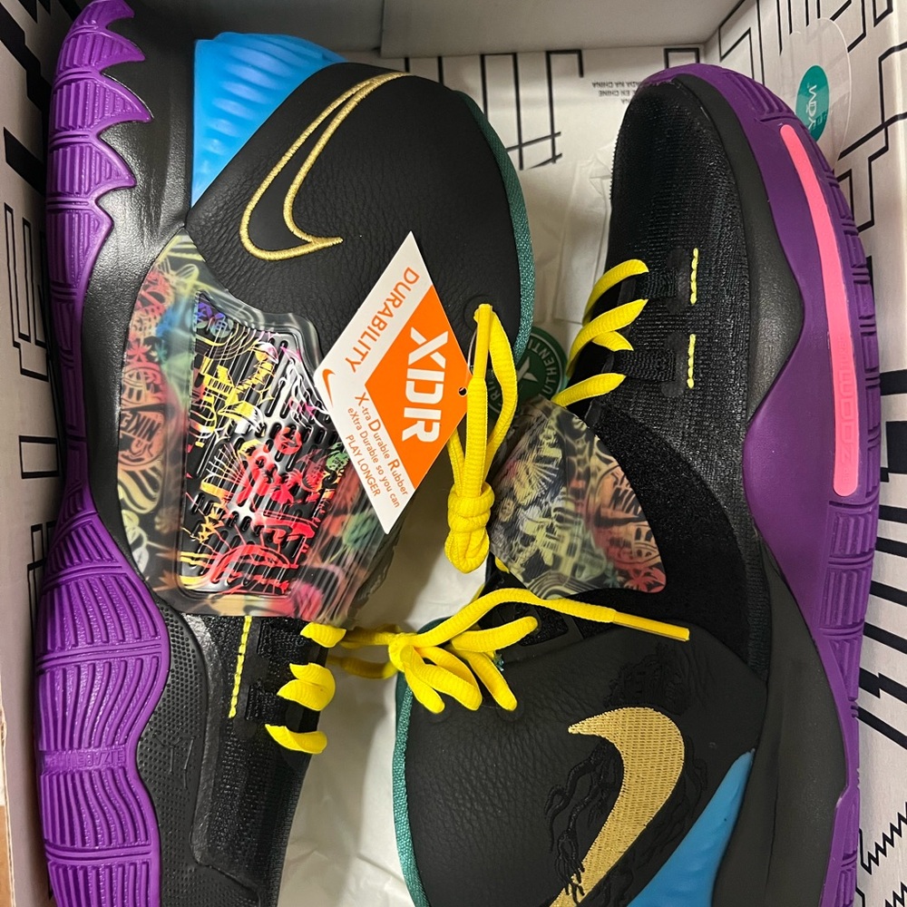 Nike Black and Purple Sneakers with Yellow Laces